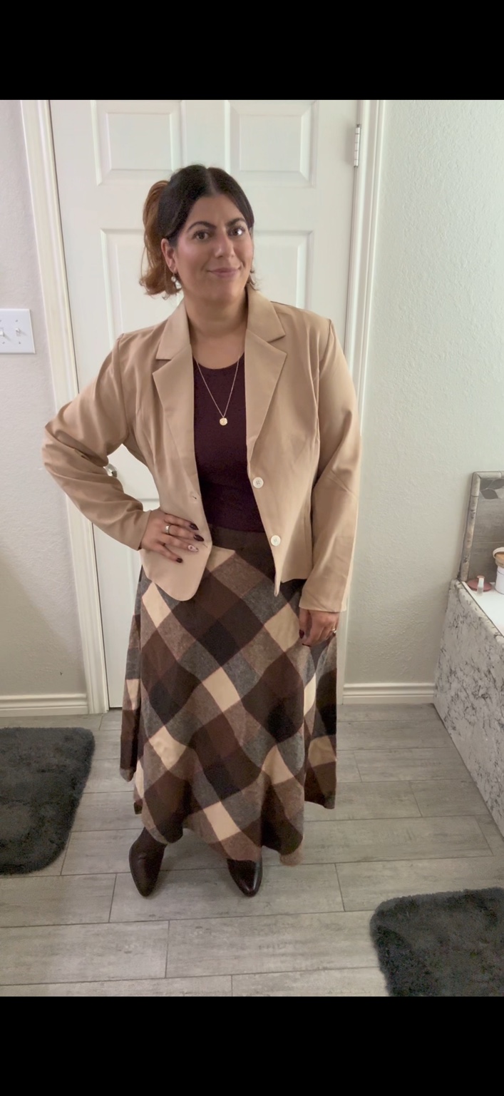 Megan wearing a casual polished outfit